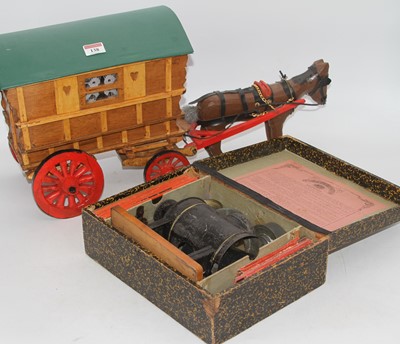 Lot 138 - A vintage magic lantern, boxed with a...