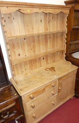 Lot 1210 - A Victorian pine dresser, the later two-tier...