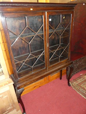 Lot 1219 - An early 20th century mahogany double door...