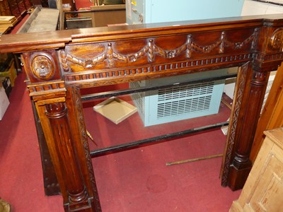 Lot 1222 - A contemporary classical style hardwood fire...