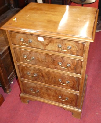 Lot 1231 - A mahogany chest of three long graduated...