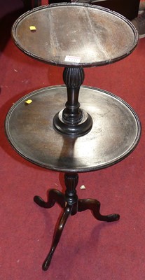 Lot 1233 - A stained mahogany circular small two-tier...