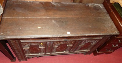 Lot 1240 - An 18th century joined oak three-panelled...