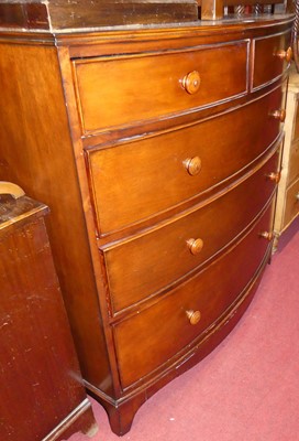 Lot 1255 - A contemporary mahogany bowfront chest of two...