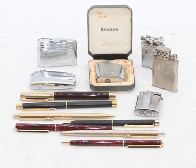 Lot 400 - A collection of vintage pens and lighters