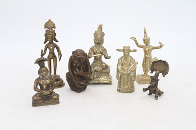 Lot 416 - A collection of Eastern brass figures