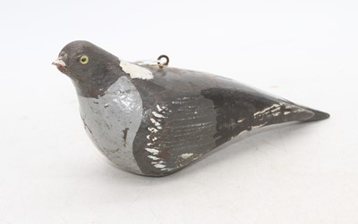 Lot 449 - A carved and painted decoy pigeon, length 30cm