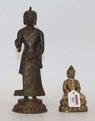 Lot 462 - An Eastern brass figure of a deity, h.27cm;...