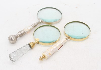 Lot 468 - Three various table magnifying glasses, the...