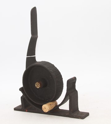 Lot 472 - A Victorian iron cork compressor, h.29cm