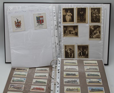 Lot 478 - Two albums, a large collection of cigarette...