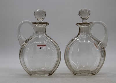 Lot 481 - A pair of cut glass claret jugs, h.23cm