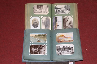 Lot 512 - Two vintage postcard albums, mainly containing...