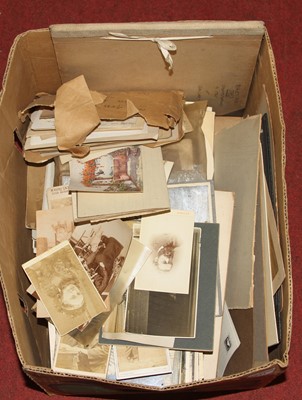 Lot 524 - A collection of vintage photographs and postcards