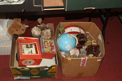 Lot 621 - Two boxes of vintage toys, to include dolls...