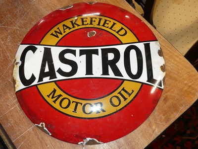 Lot 1100 - A convex enamel advertising sign for Castrol...