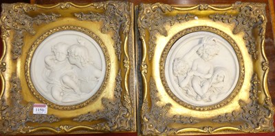 Lot 1150 - A pair of reproduction alabaster relief...