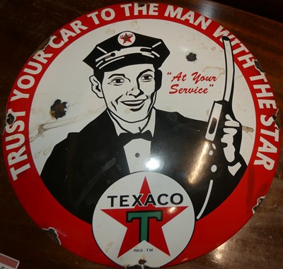 Lot 1155 - An enamel convex advertising sign for Texaco,...