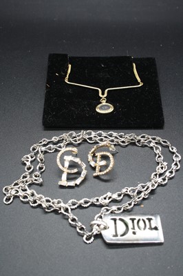 Lot 321 - After Christian Dior - a metal necklace with...