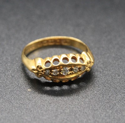 Lot 336 - A vintage 18ct gold diamond five stone ring,...