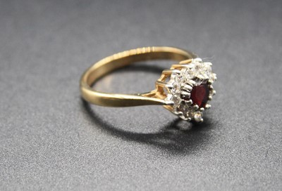 Lot 339 - A modern 9ct gold, ruby and white sapphire set...