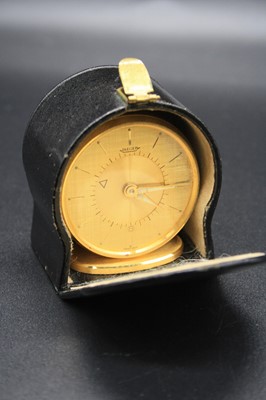 Lot 370 - A Jaeger gilt brass cased travelling alarm...