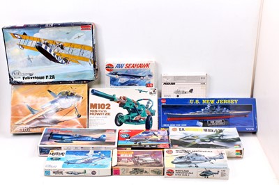 Lot 937 - One box containing 11 boxed military themed...