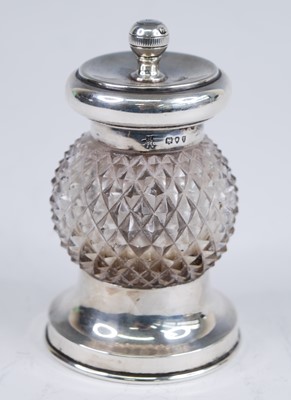 Lot 163 - A circa 1900 silver pepper mill, having...