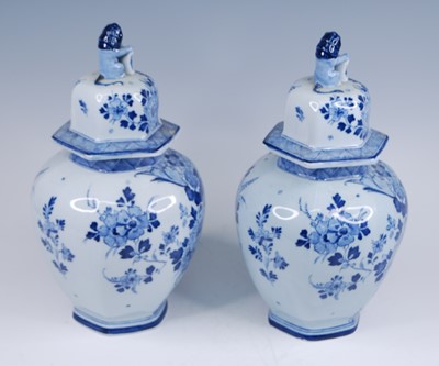 Lot 2065 - A pair of Royal Mosa blue and white urns, 20th...