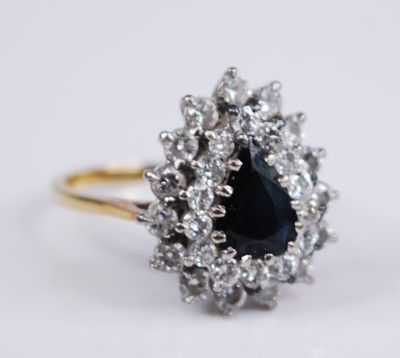 Lot 2380 - An 18ct yellow and white gold, sapphire and...