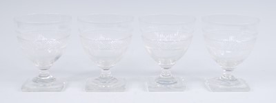 Lot 2236 - A set of four Regency glass rummers, the bowl...