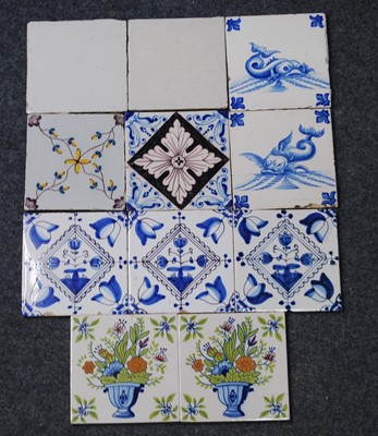 Lot 2124 - A collection of eleven various delftware tiles,...