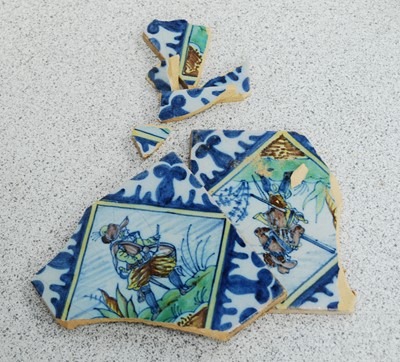 Lot 2124 - A collection of eleven various delftware tiles,...
