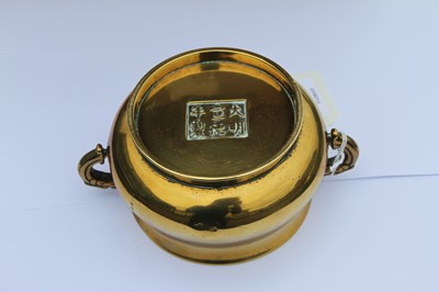 Lot 2546 - A Chinese gilt bronze censer, having applied...