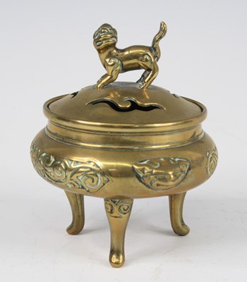 Lot 2542 - A Chinese gilt bronze tripod censer and cover,...