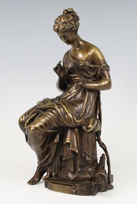 Lot 2526 - A late 19th century bronze model of a seated...