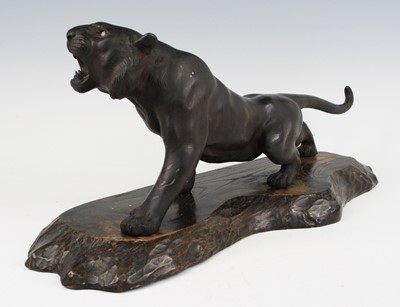 Lot 2559 - A Japanese bronze tiger, Meiji period, the...