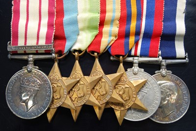 Lot 691 - A Naval group of seven medals, to include...