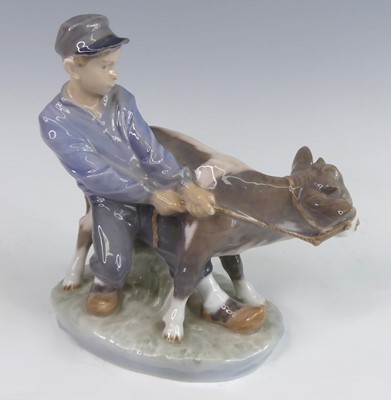 Lot 107 - A Royal Copenhagen glazed porcelain figure...