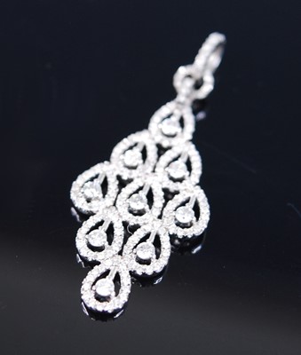Lot 2329 - A white metal diamond set navette shaped multi-...