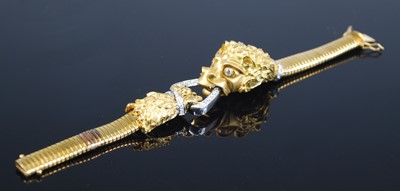 Lot 2395 - A yellow metal diamond set bracelet in the...