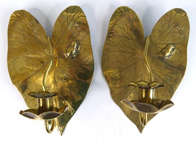 Lot 247 - A pair of Arts & Crafts brass wall sconces,...