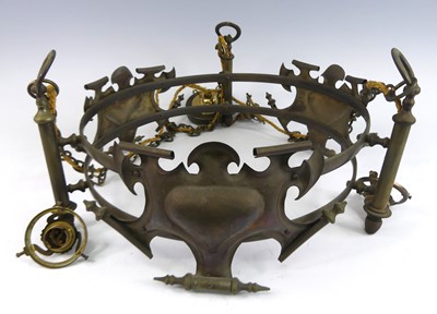 Lot 239 - An Arts & Crafts brass circular suspended...