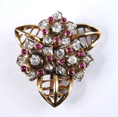 Lot 2309 - A yellow metal, ruby and diamond floral...