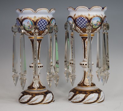 Lot 2244 - A pair of Bohemian blue and white overlaid...