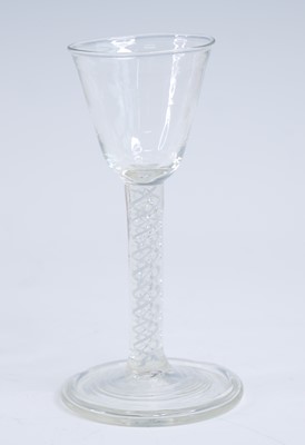 Lot 2237 - A wine glass, having a round funnel bowl above...