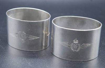 Lot 634 - A pair of George V. silver napkin rings, each...