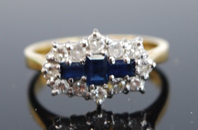 Lot 2501 - An 18ct yellow and white gold, sapphire and...