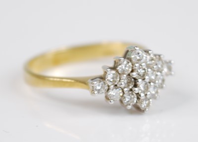 Lot 2756 - An 18ct yellow and white gold diamond navette...