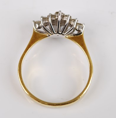 Lot 2502 - An 18ct yellow and white gold diamond navette...